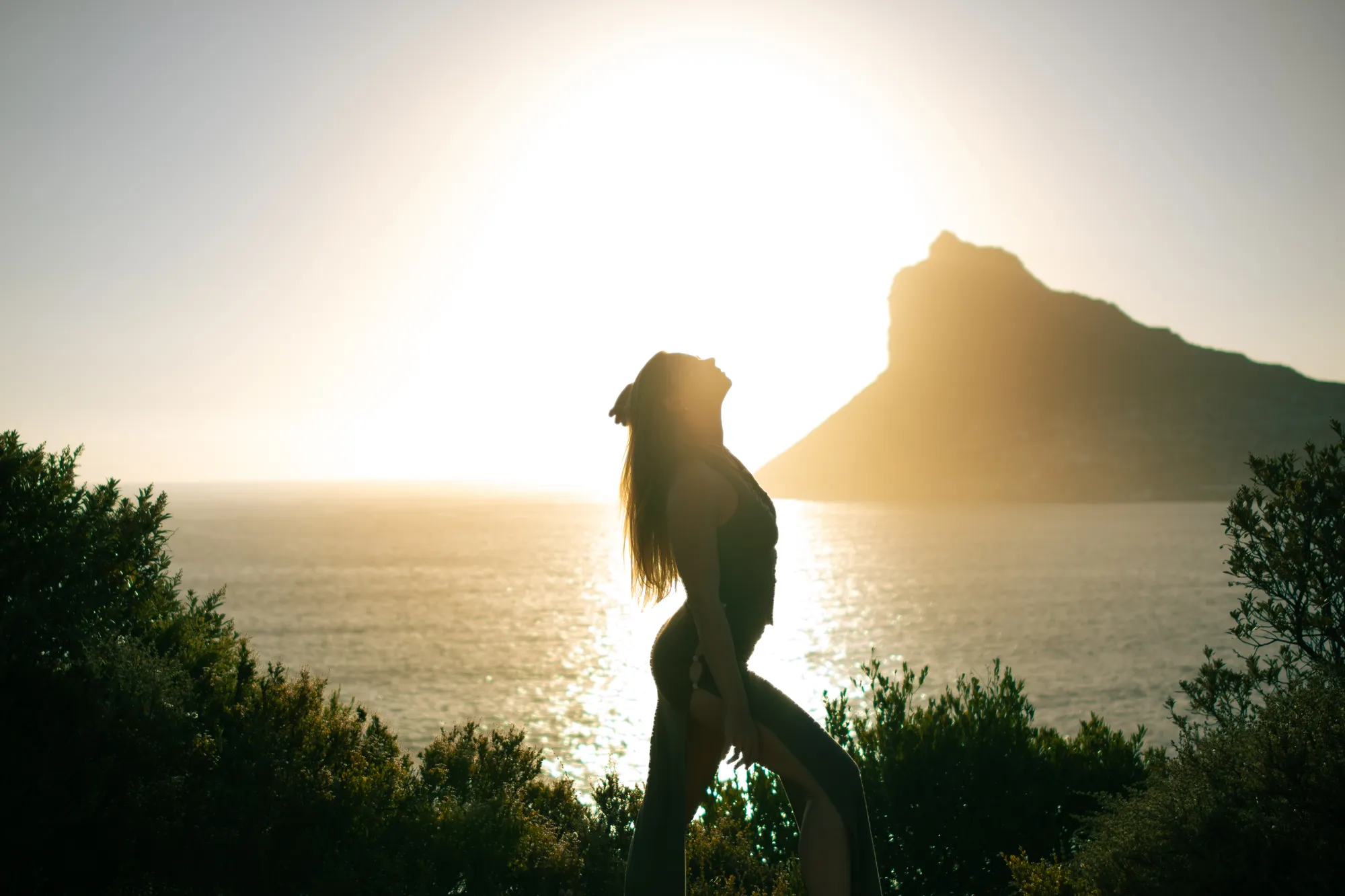 Dramatic sunset silhouette of Madison on mountain